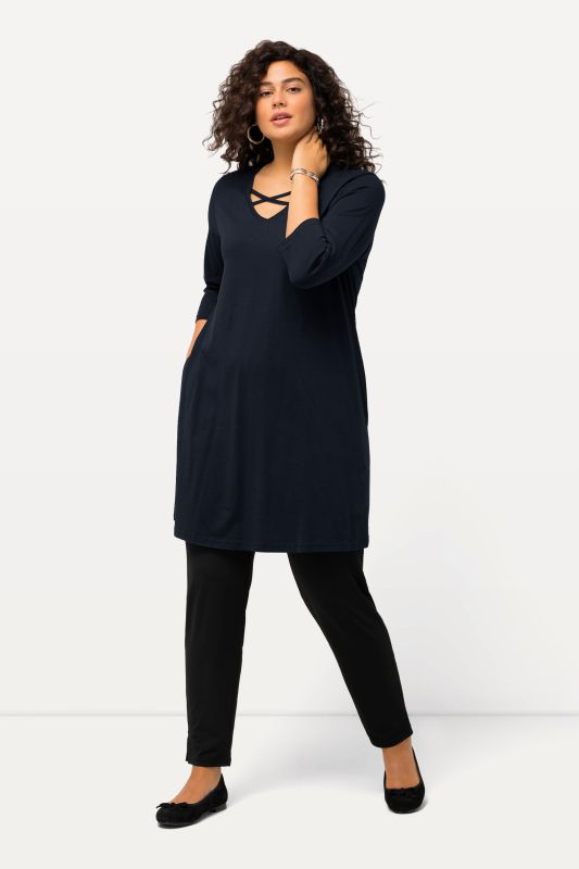 Criss Cross V-Neckline Swing Knit Tunic