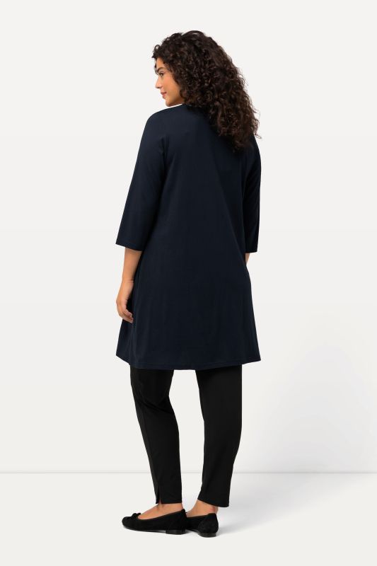 Criss Cross V-Neckline Swing Knit Tunic
