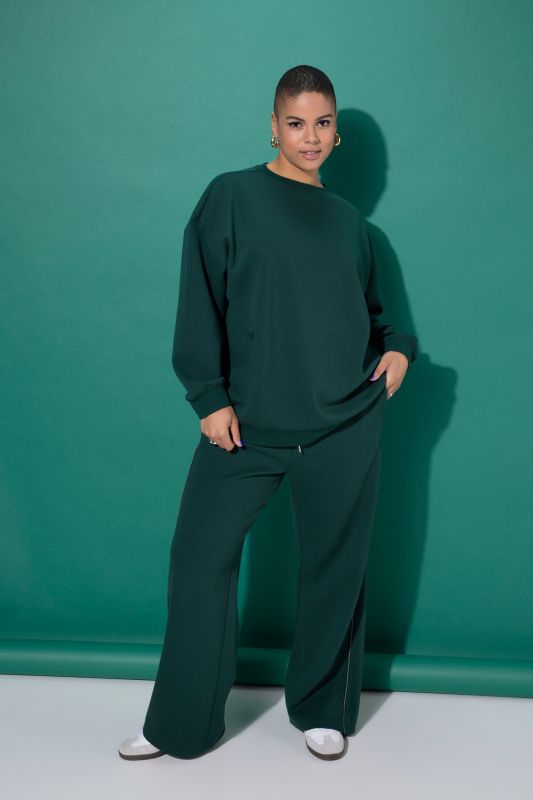 Суитчър с разкроена кройка