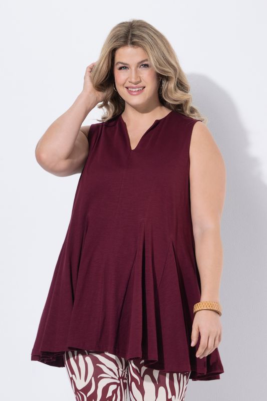 Туника с плисирани акценти