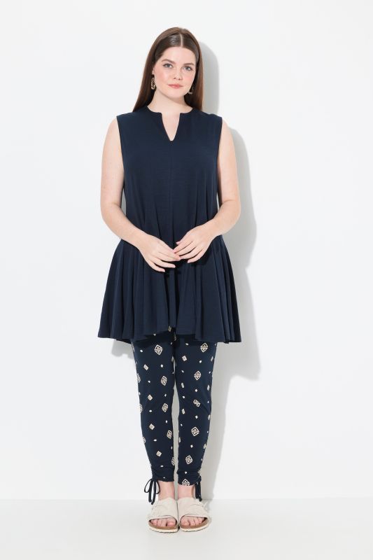 Туника с плисирани акценти