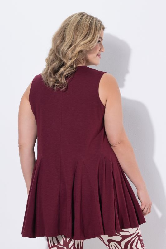 Туника с плисирани акценти