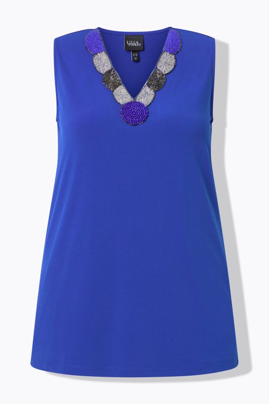 Потник с мъниста на деколтето