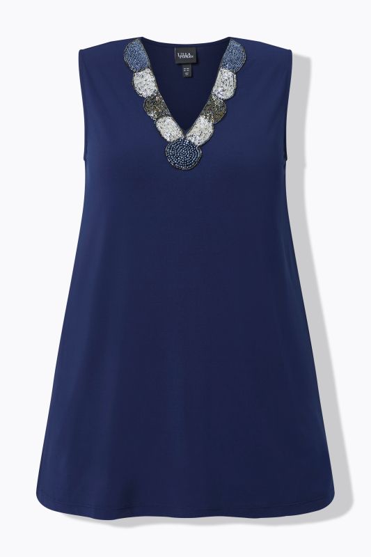 Потник с мъниста на деколтето