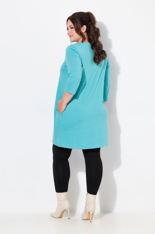 Criss Cross V-Neckline Swing Knit Tunic