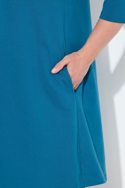 Criss Cross V-Neckline Swing Knit Tunic